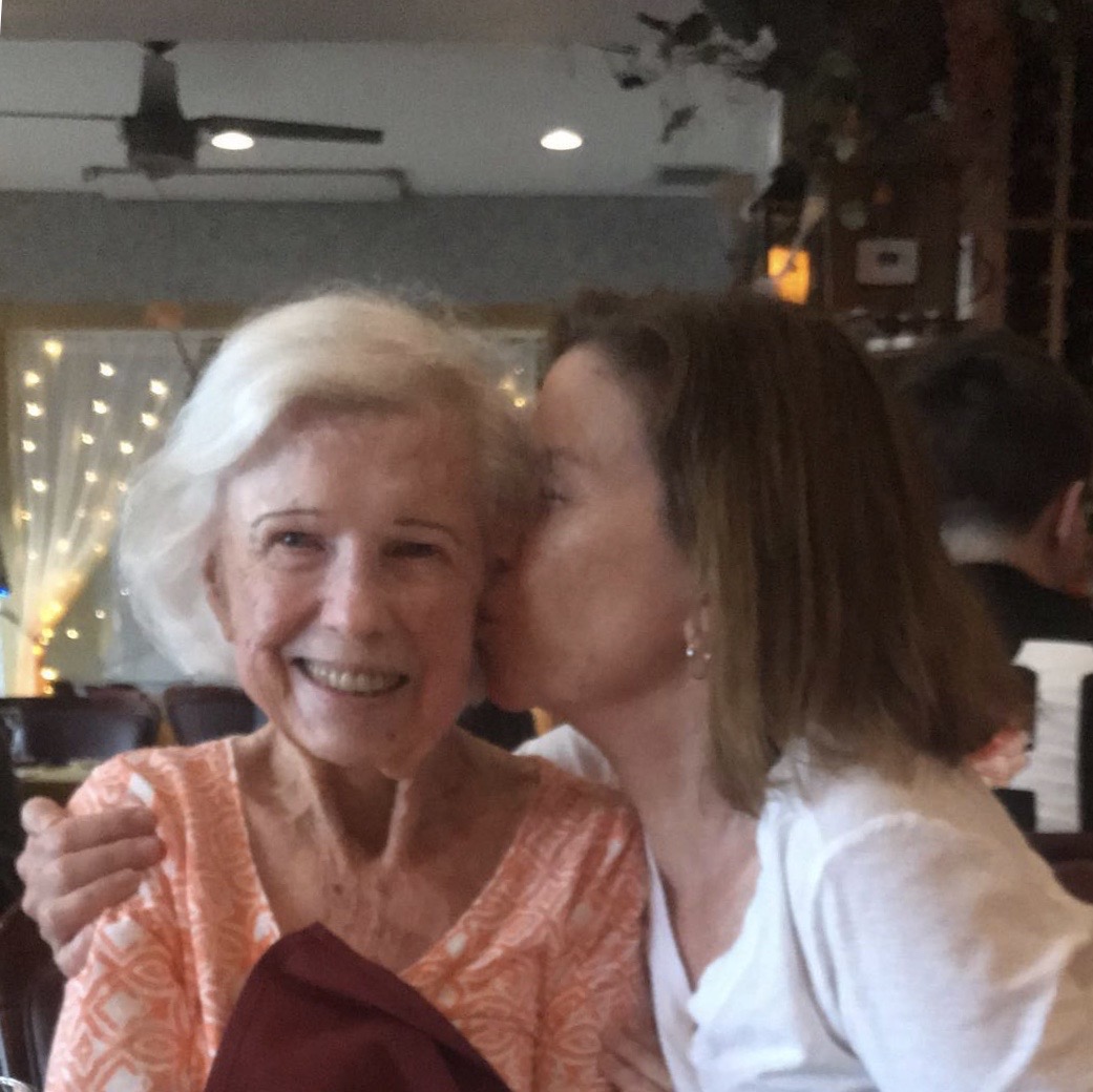 Katie Yeakle kissing Kathleen on the cheek