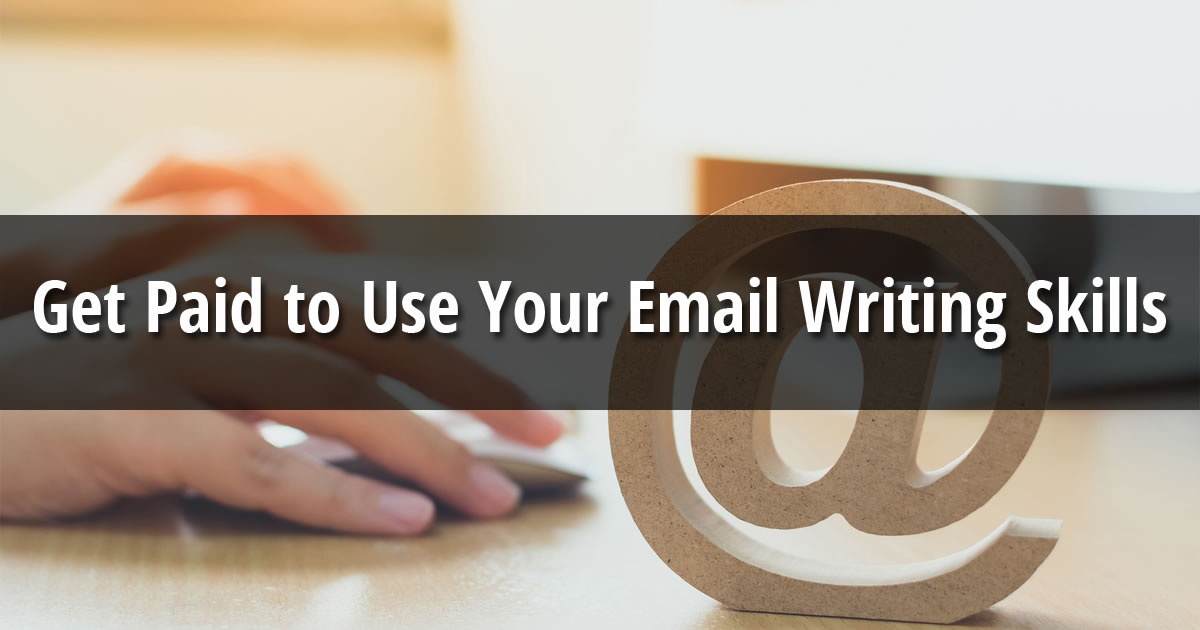 Email at symbol in front of women at desk using computer